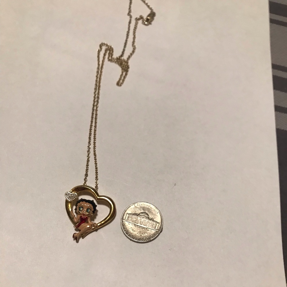 Betty Boop heart shaped pendant with small crystals with chain.